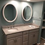 New bath vanity with oval mirrors