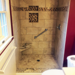 Tiled shower with granite seat and sill